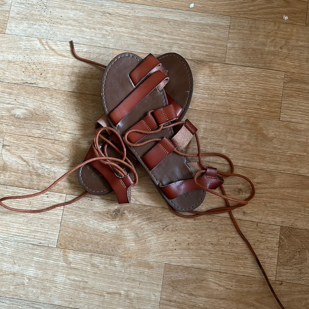 Woman’s brown sandals